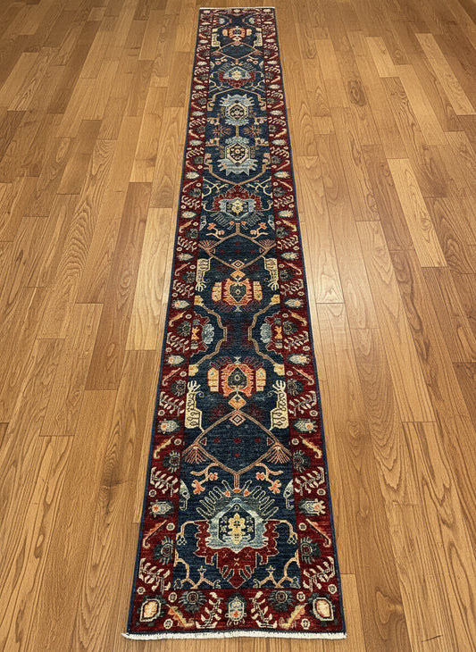 Long, narrow patterned rug on a gray floo